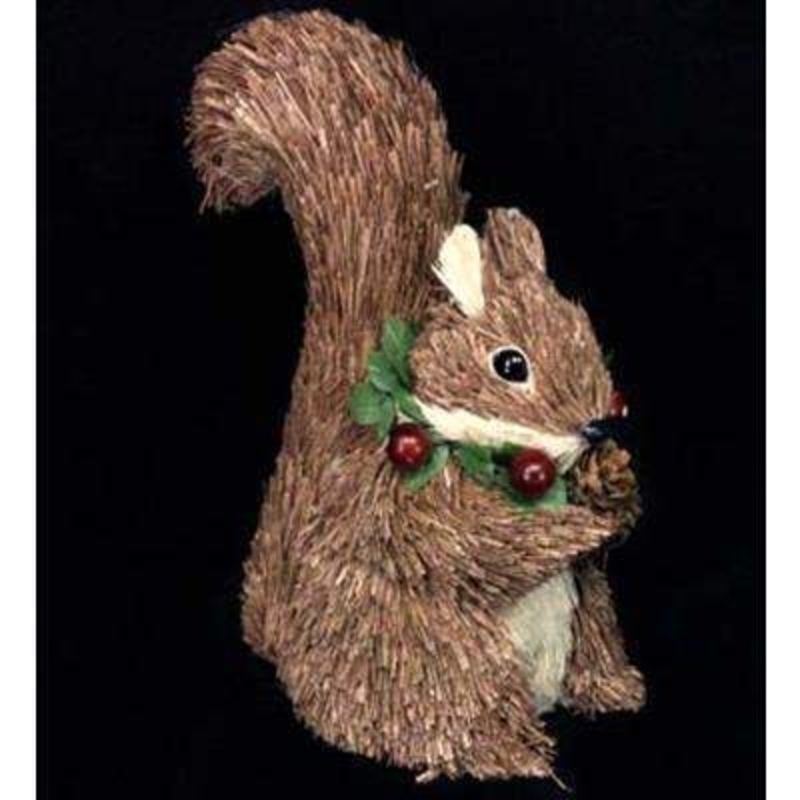 Sit this Christmas squirrel on your mantelpiece or window ledge to watch over all the festivities. Wearing a berry wreath around his neck and clutching a pinecone he is perfect for a woodland themed Christmas. Approx size (LxWxD) 16x14x8cm